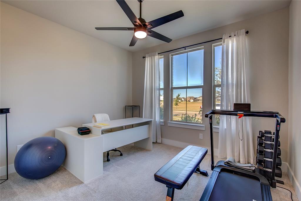 1872 Big Spring Drive Forney, TX 75126 - Photo 25 of 40 a living room with furniture and a window