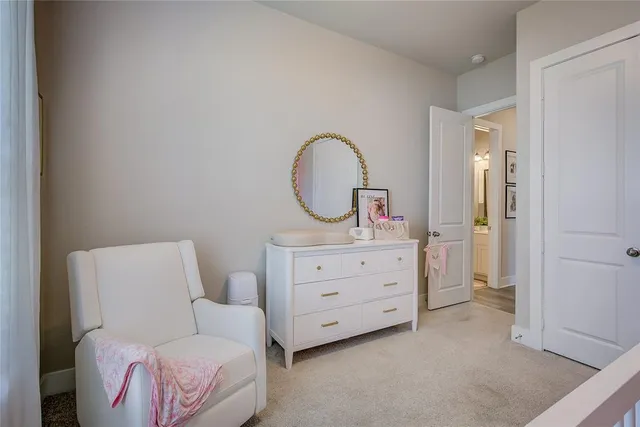 a bed room with a bed and a window