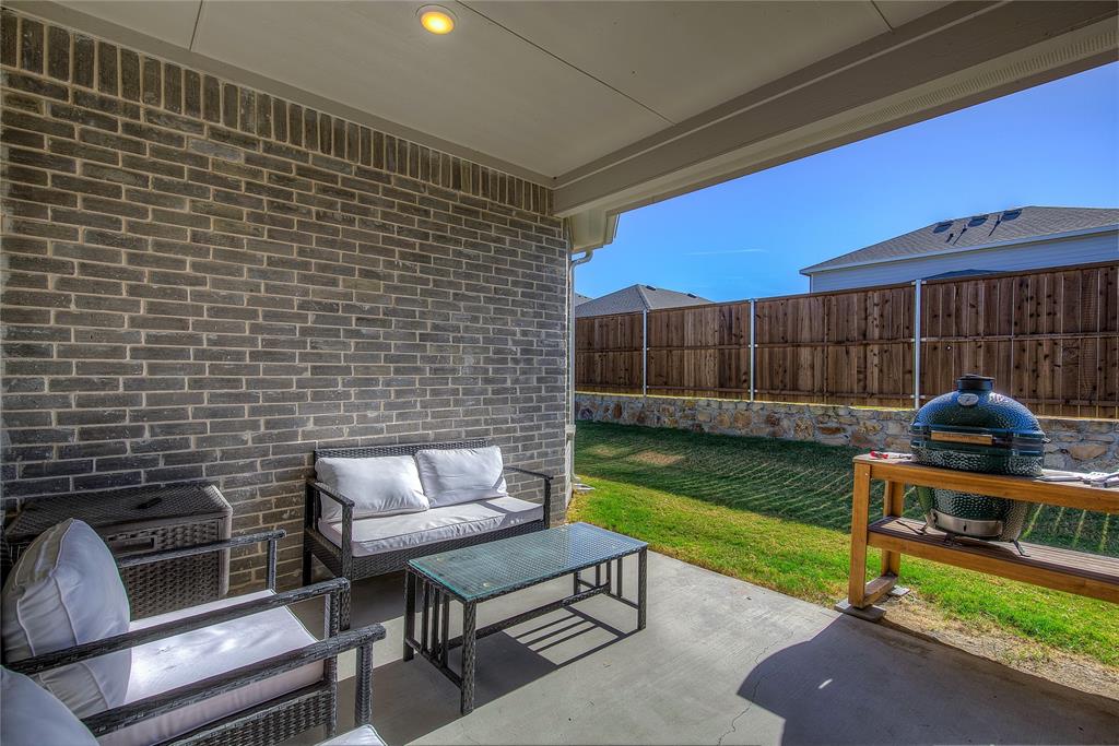 1872 Big Spring Drive Forney, TX 75126 - Photo 31 of 40 a view of a chairs and backyard with a tub