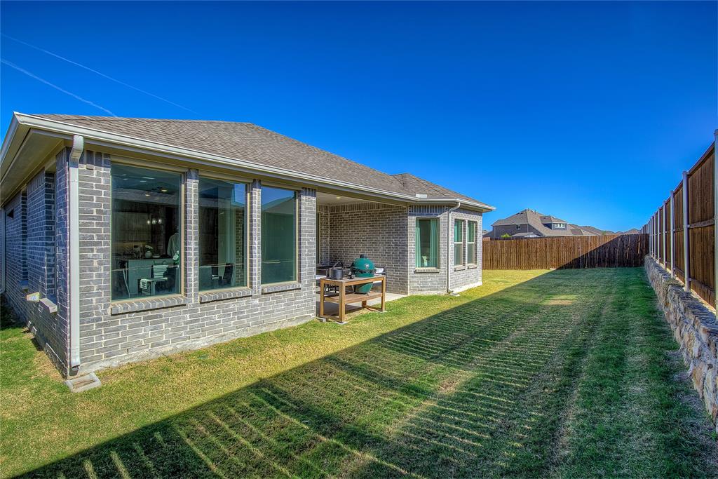 1872 Big Spring Drive Forney, TX 75126 - Photo 33 of 40 a view of a house with backyard porch and sitting area