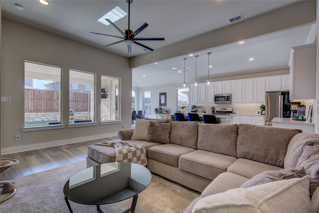 1872 Big Spring Drive Forney, TX 75126 - Photo 10 of 40 a view of a living room kitchen and a large window