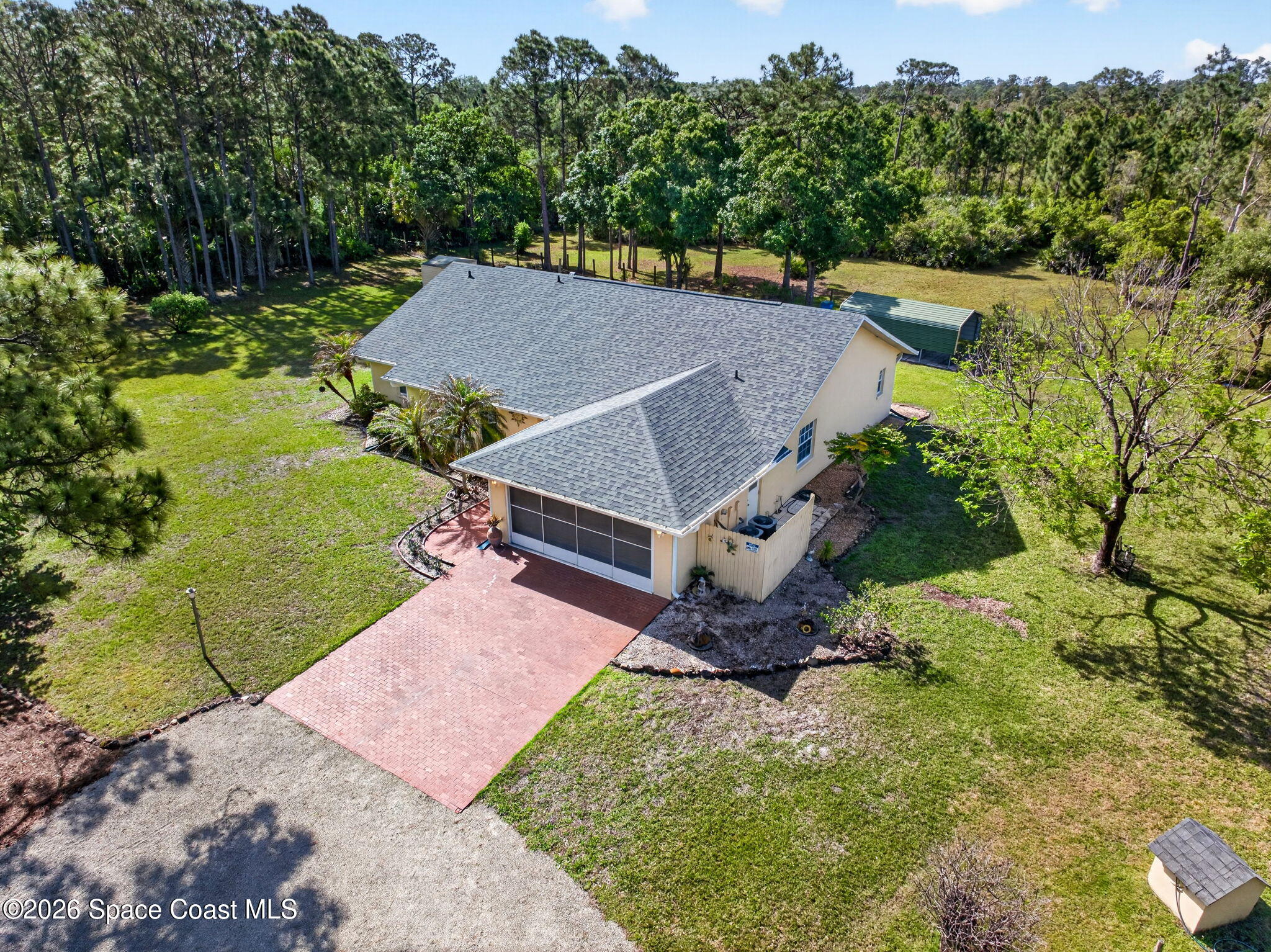 1455 Atz Road Malabar, FL 32950 - Photo 12 of 73 an aerial view of a house