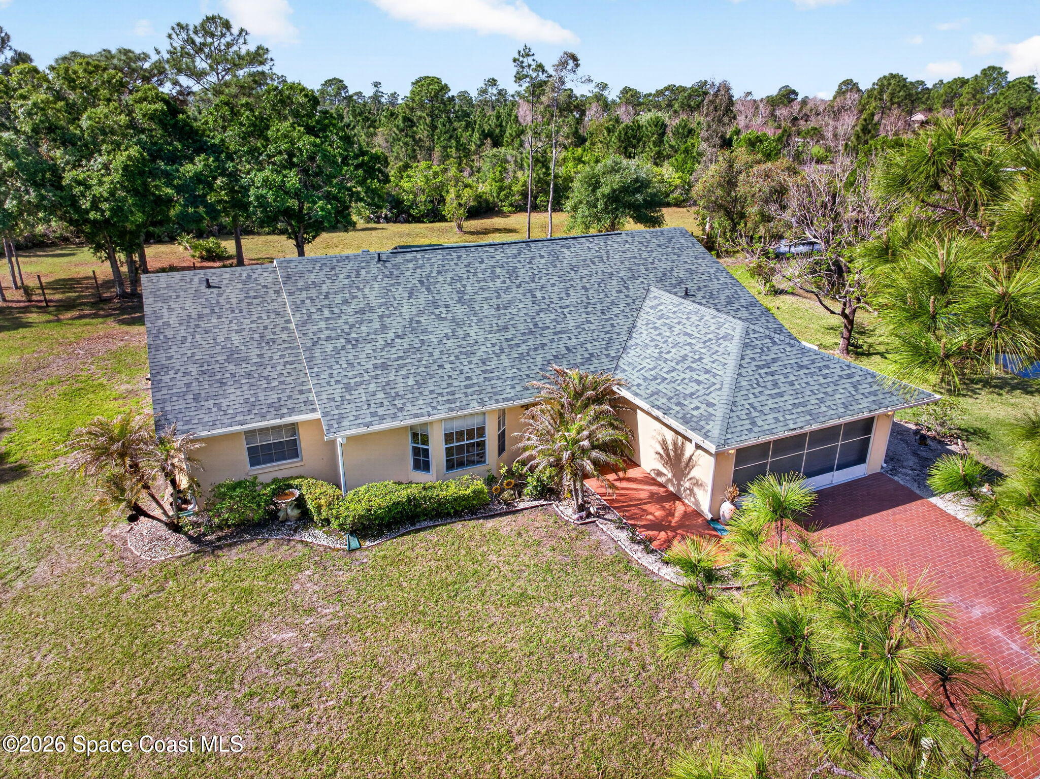 1455 Atz Road Malabar, FL 32950 - Photo 3 of 72 an aerial view of house with yard and trees in the background