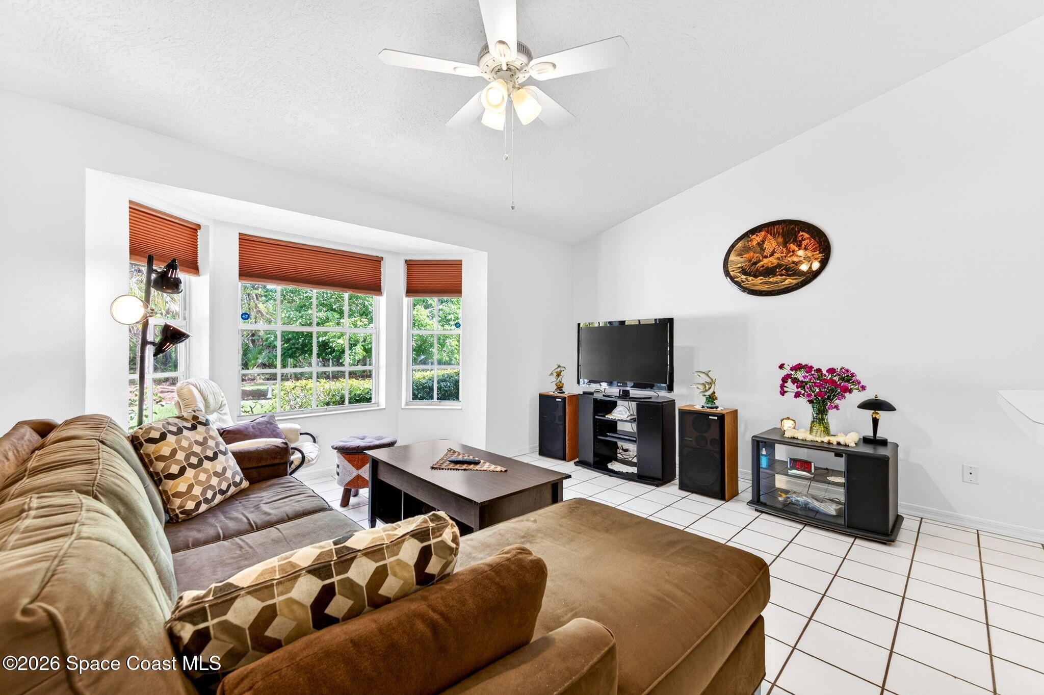 1455 Atz Road Malabar, FL 32950 - Photo 53 of 72 a living room with furniture and a flat screen tv