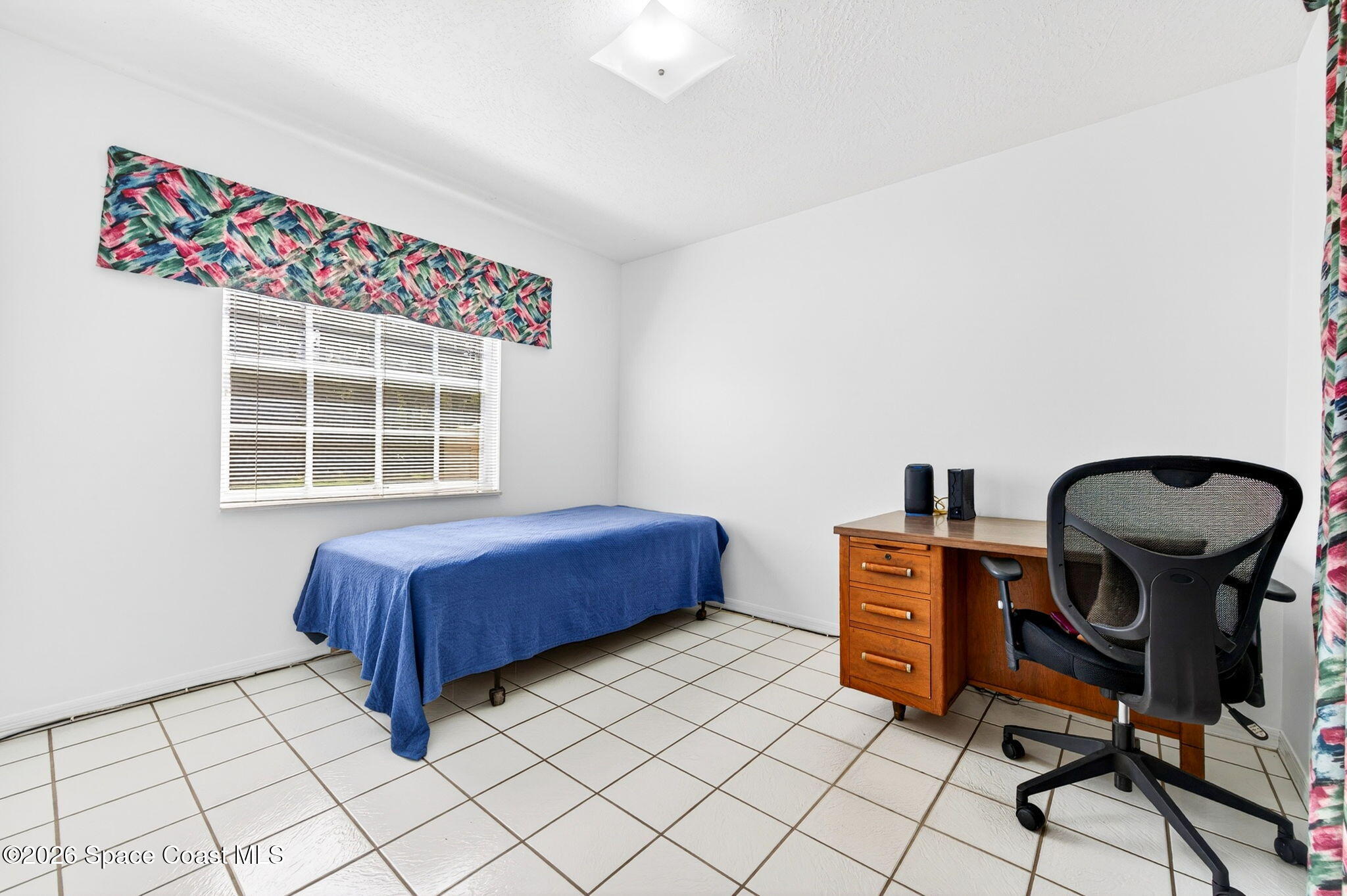 1455 Atz Road Malabar, FL 32950 - Photo 58 of 72 a view of a workspace with furniture and a window