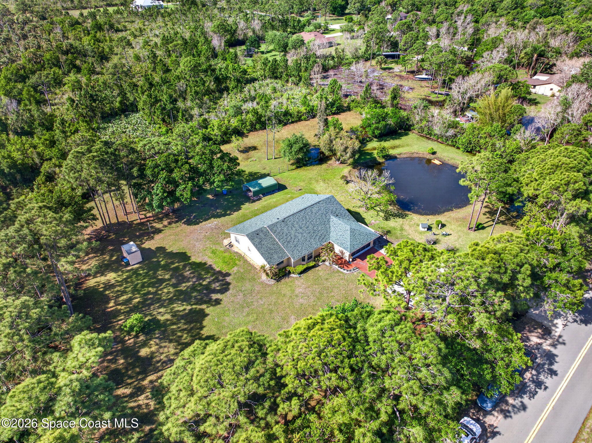 1455 Atz Road Malabar, FL 32950 - Photo 72 of 73 an aerial view of residential house with outdoor space