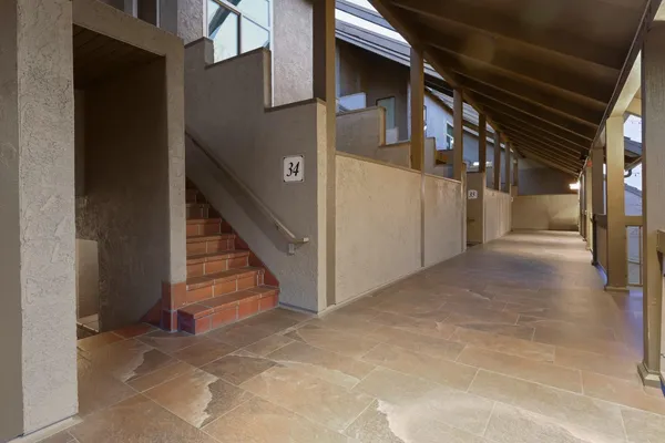 a view of a house with wooden walls