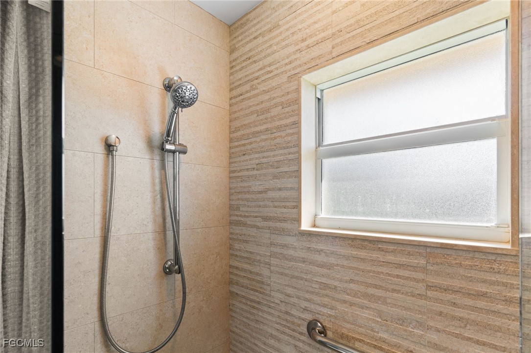 601 Periwinkle Way, Unit C5 Sanibel, FL 33957 - Photo 24 of 35 a bathroom with a shower