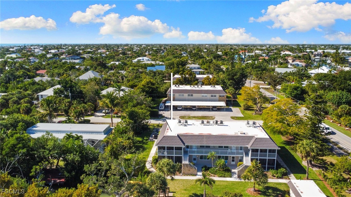 601 Periwinkle Way, Unit C5 Sanibel, FL 33957 - Photo 31 of 35 a view of a city with tall buildings