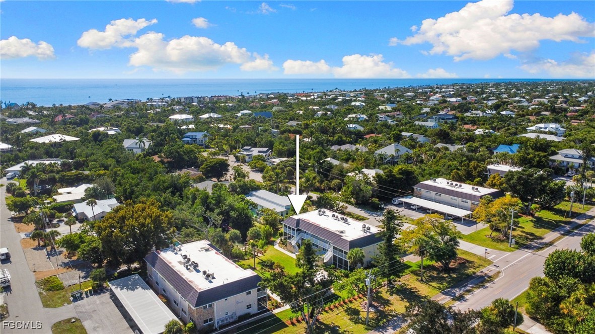 601 Periwinkle Way, Unit C5 Sanibel, FL 33957 - Photo 32 of 35 an aerial view of a house with a yard