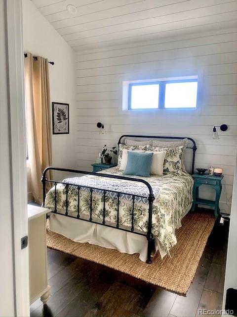 560 Talons Reach Run Berthoud, CO 80513 - Photo 13 of 43 a bed sitting in a bedroom next to a window