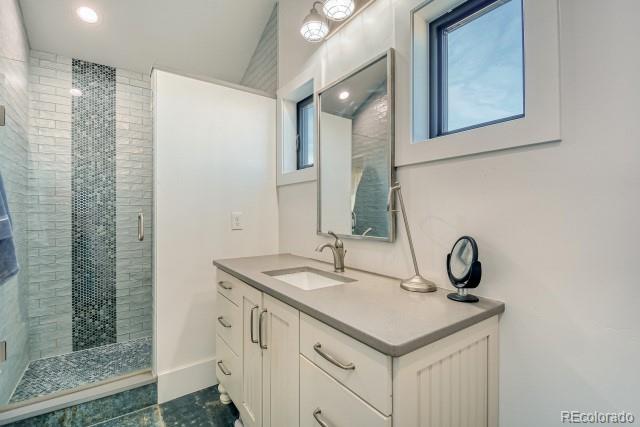 560 Talons Reach Run Berthoud, CO 80513 - Photo 18 of 43 a bathroom with a sink and a mirror