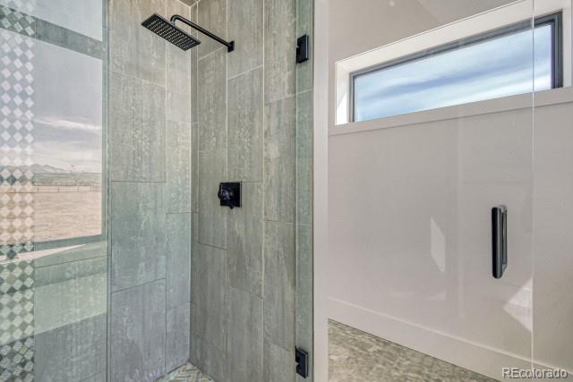 560 Talons Reach Run Berthoud, CO 80513 - Photo 23 of 43 a bathroom with a shower