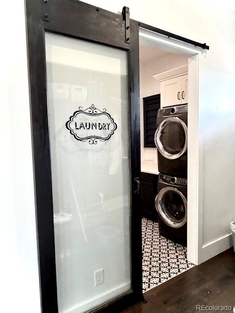 560 Talons Reach Run Berthoud, CO 80513 - Photo 24 of 43 a view of a hallway with washer and dryer