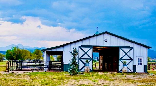 560 Talons Reach Run Berthoud, CO 80513 - Photo 28 of 43 a view of a house with wooden deck and furniture