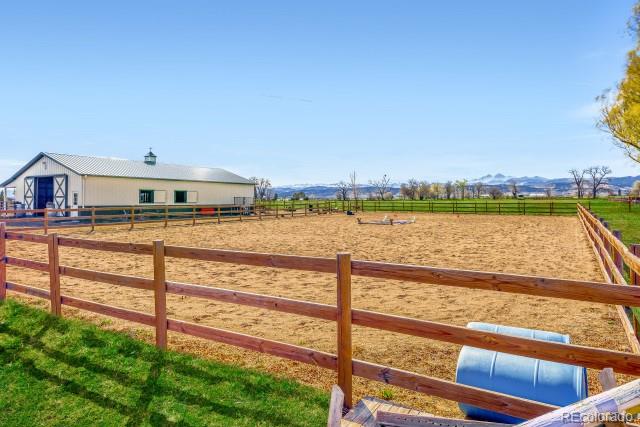 560 Talons Reach Run Berthoud, CO 80513 - Photo 34 of 43 a view of swimming pool with outdoor seating and yard