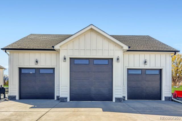 560 Talons Reach Run Berthoud, CO 80513 - Photo 37 of 43 a view of a house with a garage