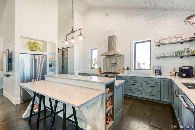 560 Talons Reach Run Berthoud, CO 80513 - Photo 5 of 43 a kitchen with a stove a sink and a refrigerator