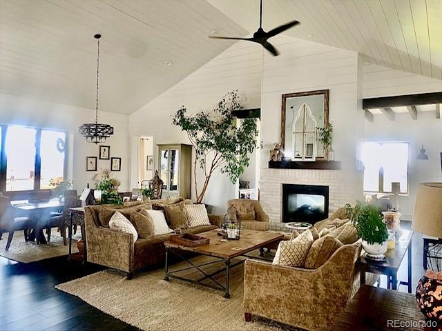 560 Talons Reach Run Berthoud, CO 80513 - Photo 10 of 43 a living room with furniture and a fireplace