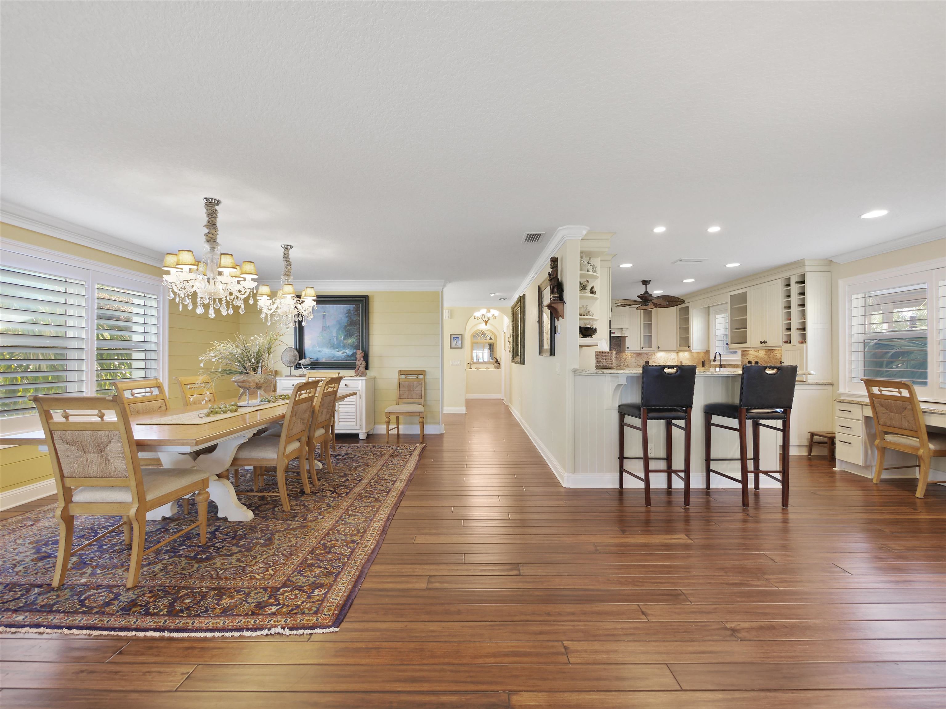 5348 Atlantic View St. Augustine, FL 32080 - Photo 11 of 60 a view of a dining room with furniture and wooden floor