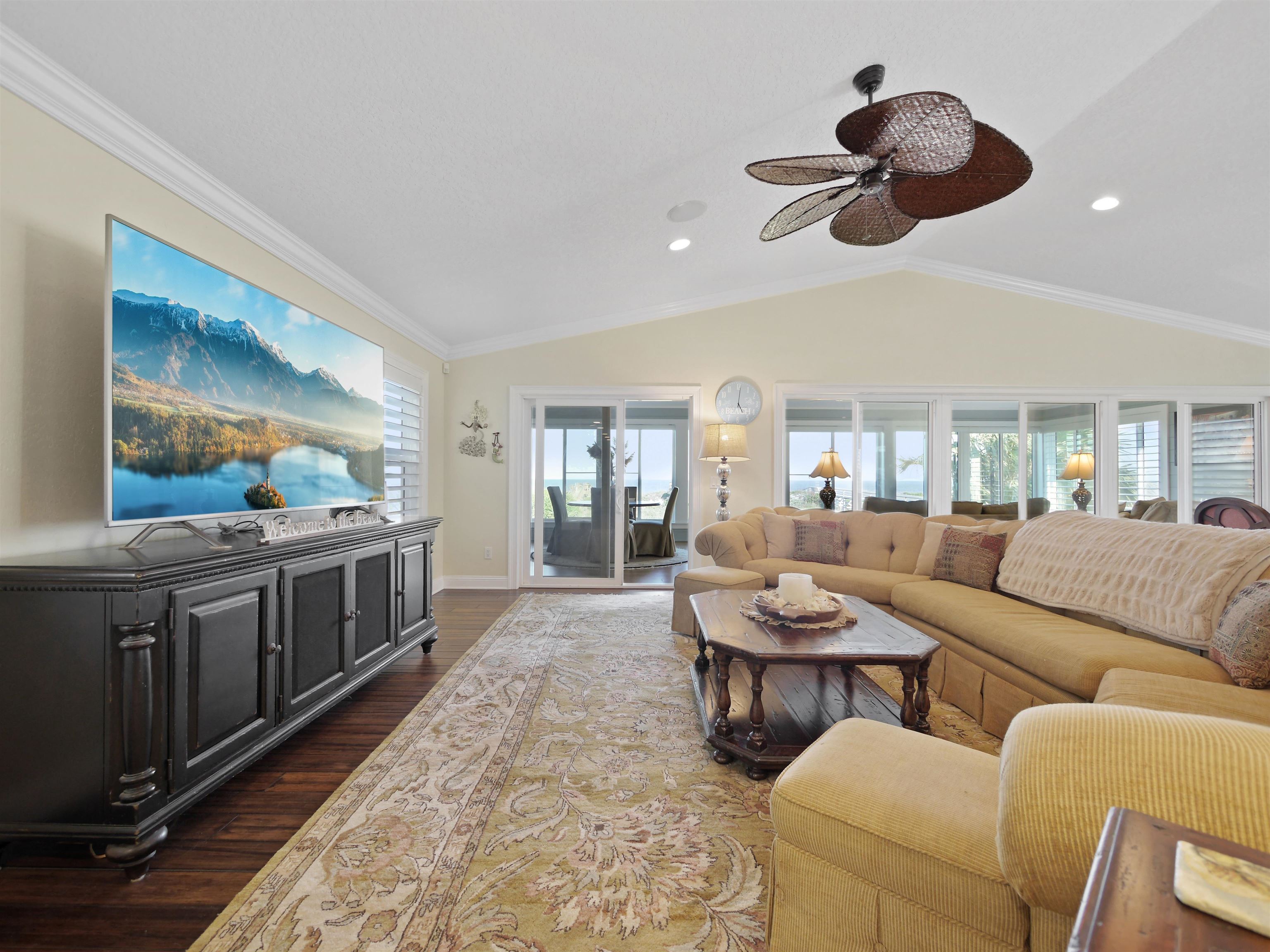 5348 Atlantic View St. Augustine, FL 32080 - Photo 15 of 60 a living room with furniture and a large window