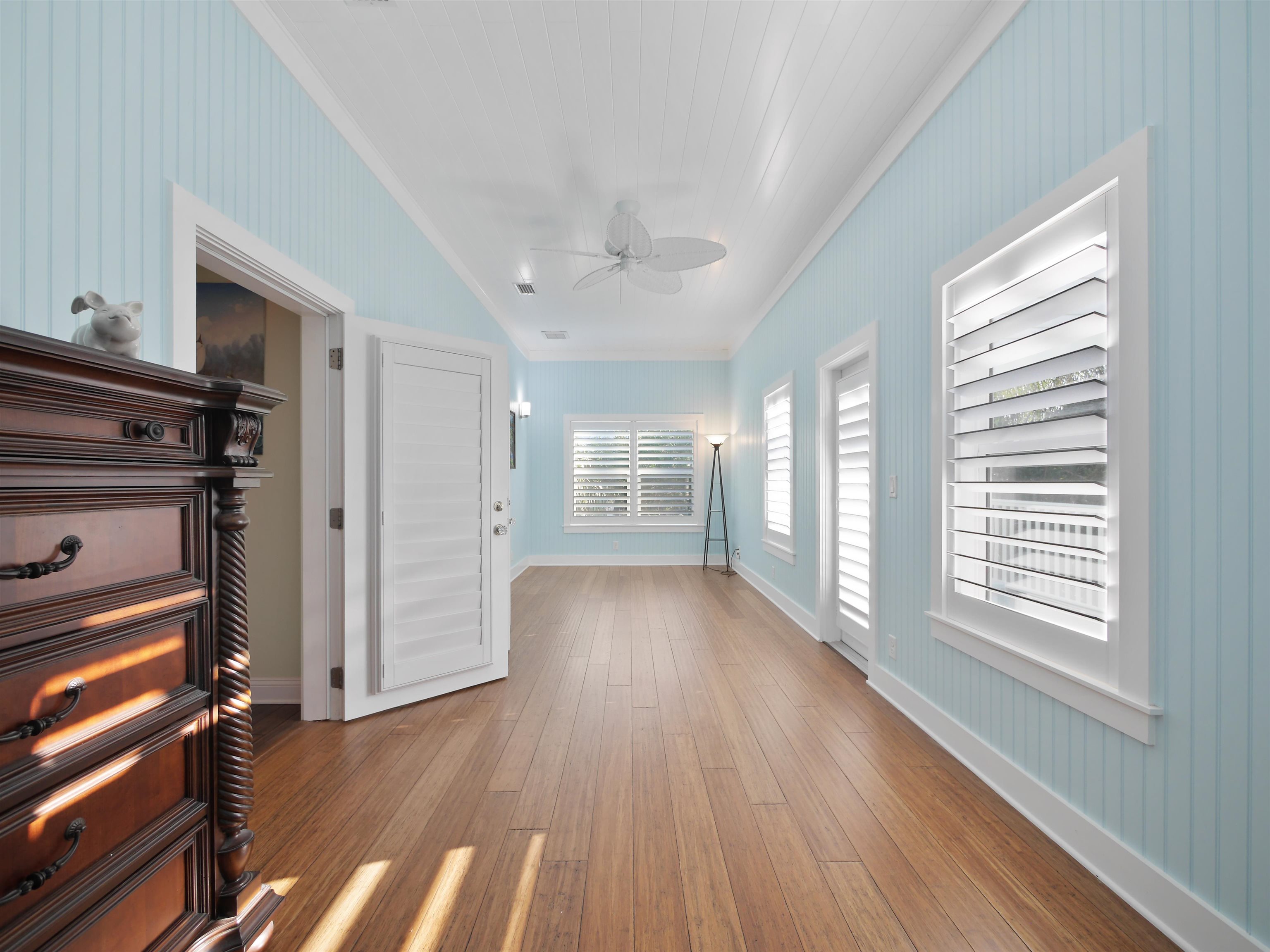 5348 Atlantic View St. Augustine, FL 32080 - Photo 28 of 60 a view of an empty room with wooden floor and a window