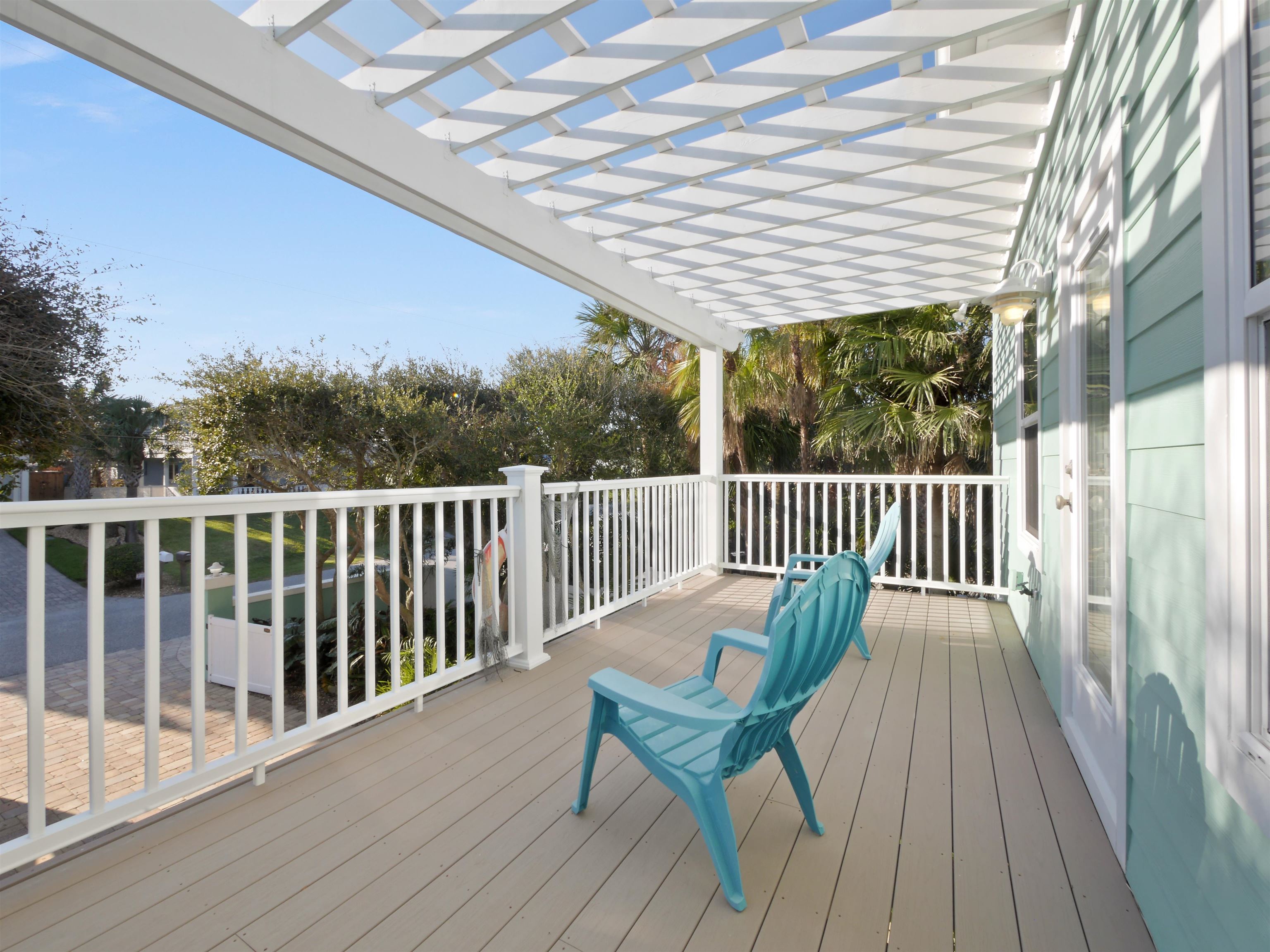 5348 Atlantic View St. Augustine, FL 32080 - Photo 30 of 60 a view of balcony with wooden floor and outdoor seating