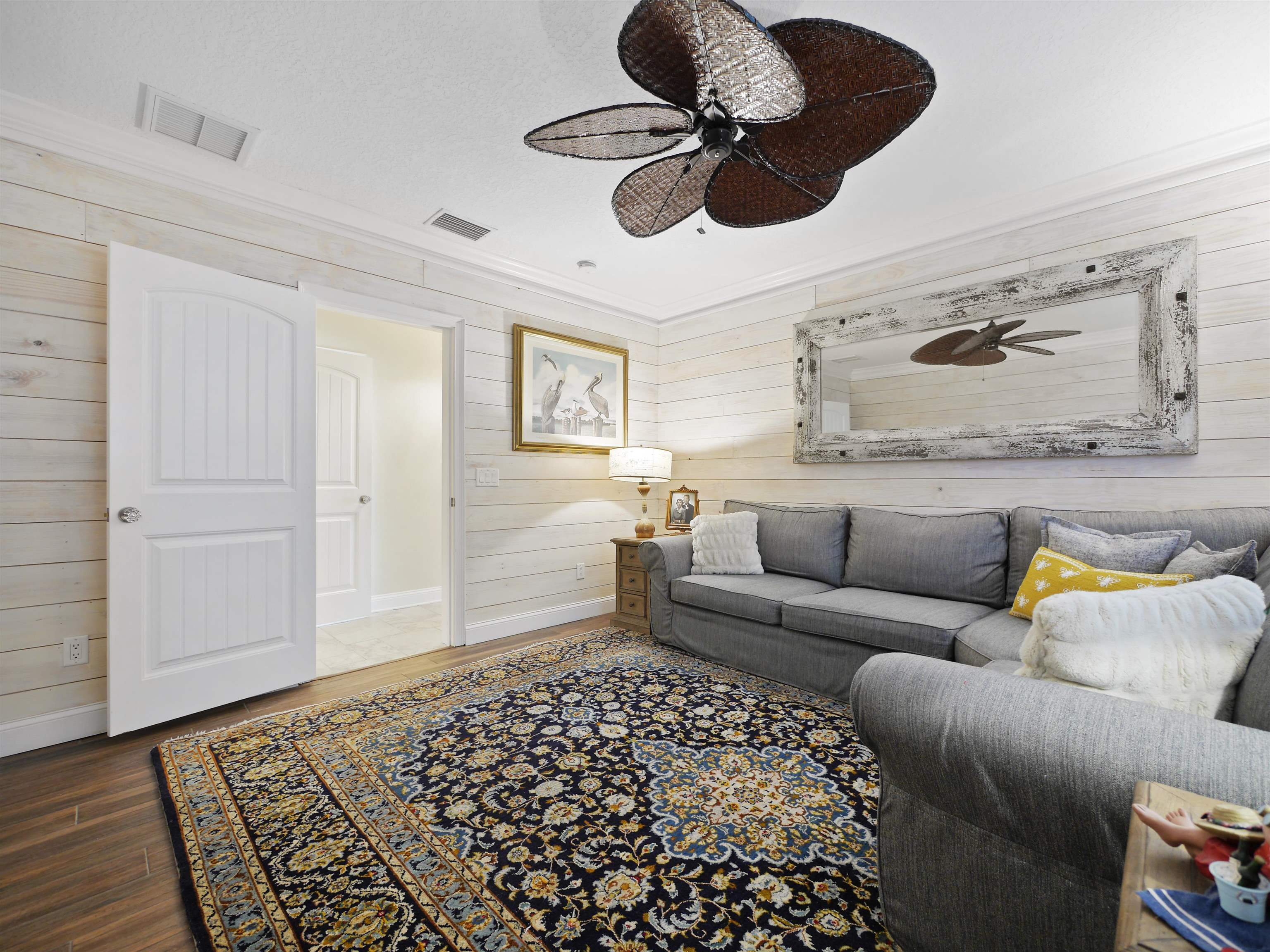 5348 Atlantic View St. Augustine, FL 32080 - Photo 46 of 60 a living room with furniture and a rug