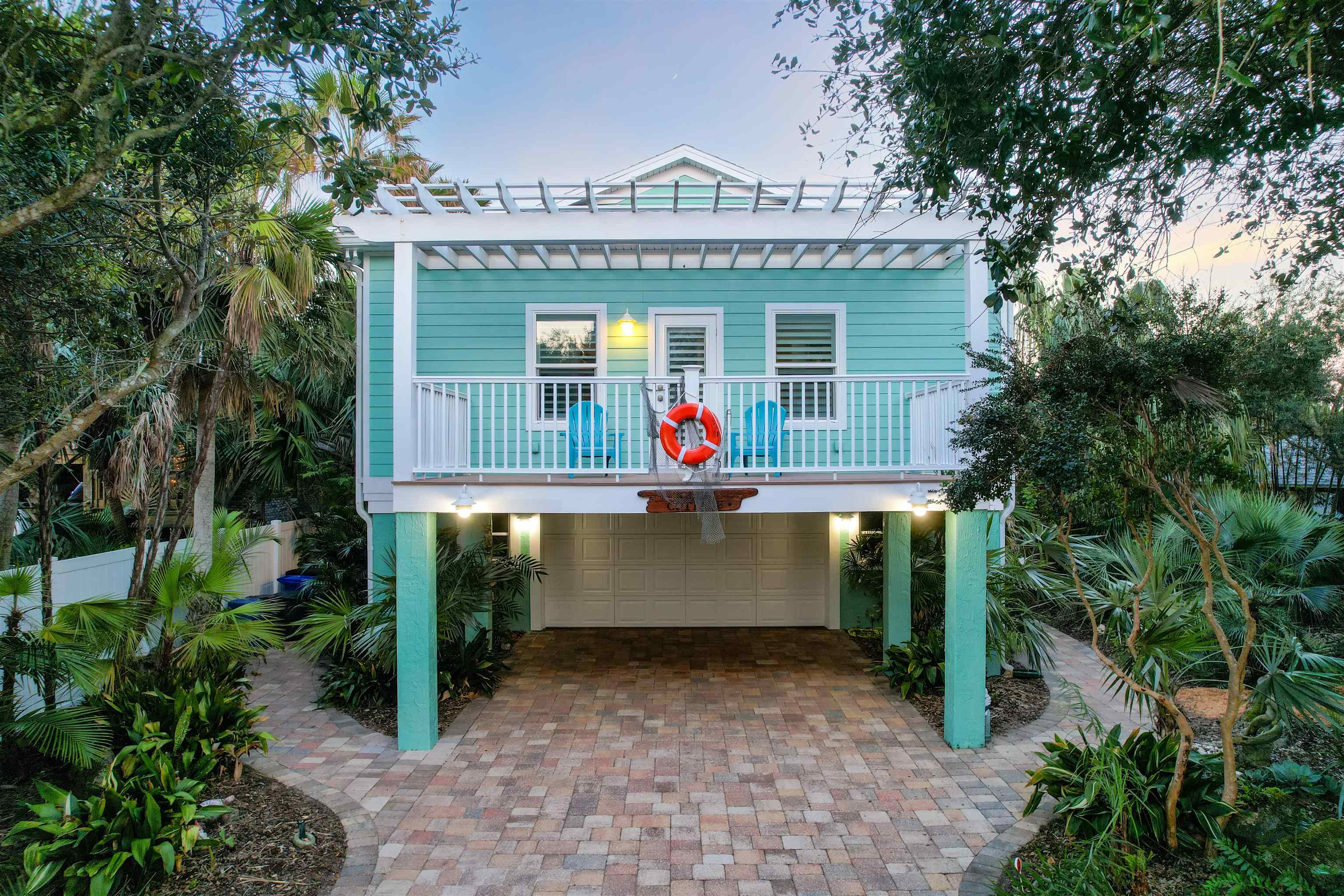 5348 Atlantic View St. Augustine, FL 32080 - Photo 55 of 60 a view of a house with a backyard and trees