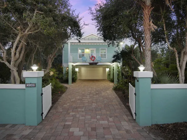 a view of a living room and hardwood floor
