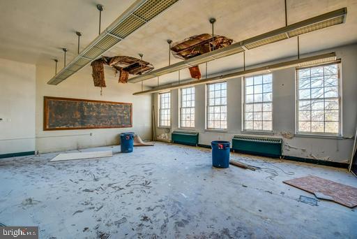 889 Butterfly Lane Frederick, MD 21703 - Photo 16 of 23 a living room with a couch