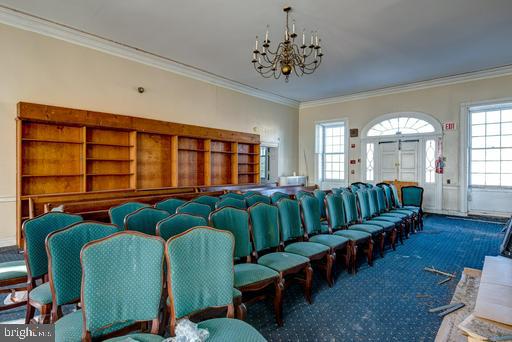 889 Butterfly Lane Frederick, MD 21703 - Photo 17 of 23 a living room with furniture and a large window
