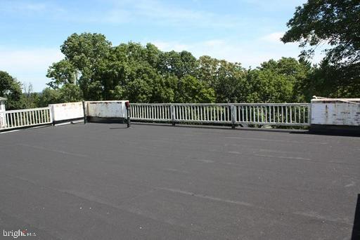 889 Butterfly Lane Frederick, MD 21703 - Photo 19 of 23 a view of a fence and trees
