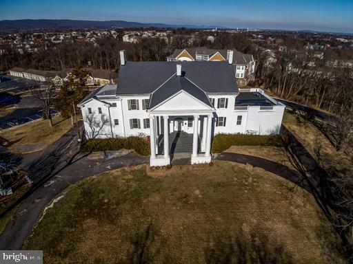 889 Butterfly Lane Frederick, MD 21703 - Photo 4 of 23 a house with a garden in front of it