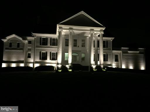 889 Butterfly Lane Frederick, MD 21703 - Photo 7 of 23 a front view of a house with a yard