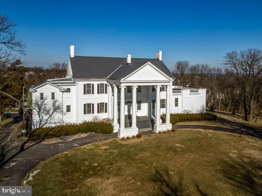 889 Butterfly Lane Frederick, MD 21703 - Photo 8 of 23 a front view of a house with a yard
