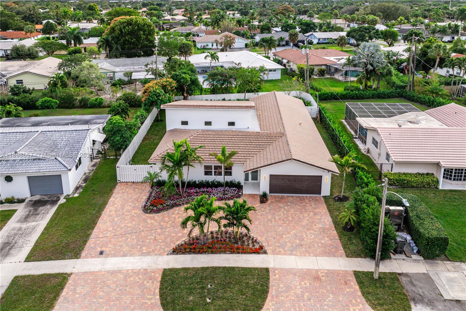 1338 Southwest 13th Street Boca Raton, FL 33486 - Photo 23 of 45 an aerial view of a house with garden space and street view