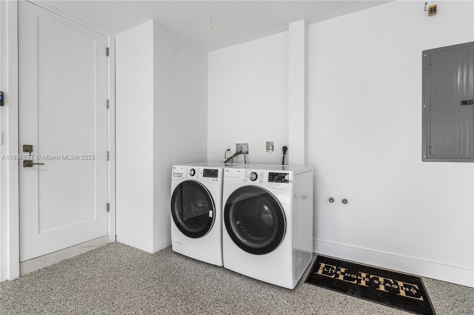 1338 Southwest 13th Street Boca Raton, FL 33486 - Photo 31 of 45 a utility room with dryer and washer