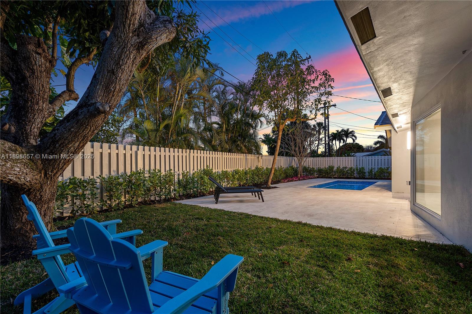 1338 Southwest 13th Street Boca Raton, FL 33486 - Photo 35 of 45 a view of backyard with seating area and green space