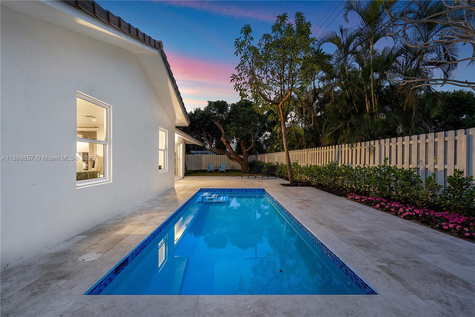 1338 Southwest 13th Street Boca Raton, FL 33486 - Photo 37 of 45 a view of an outdoor space with a swimming pool