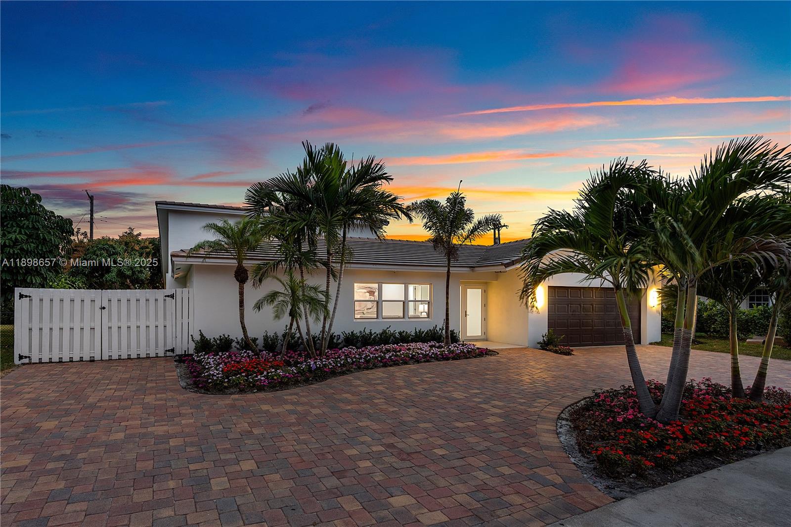 1338 Southwest 13th Street Boca Raton, FL 33486 - Photo 41 of 45 a front view of a house with a yard