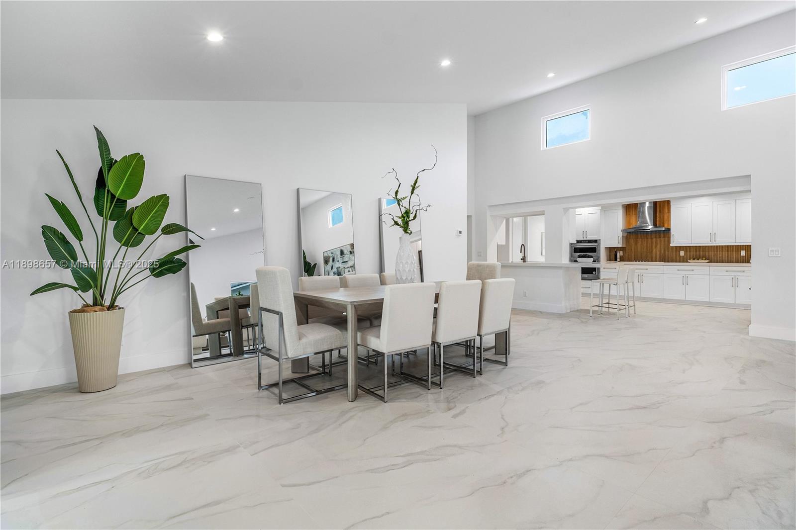 1338 Southwest 13th Street Boca Raton, FL 33486 - Photo 5 of 45 a view of a dining room with furniture