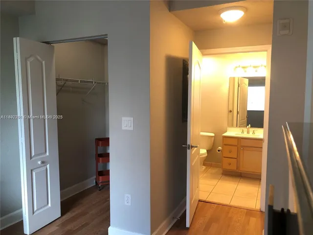 a bathroom with a tub and shower