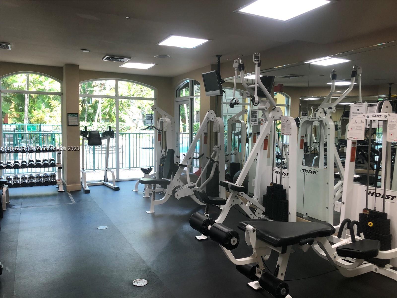 6001 Southwest 70th Street, Unit 528 South Miami, FL 33143 - Photo 20 of 21 a view of a room with gym equipment
