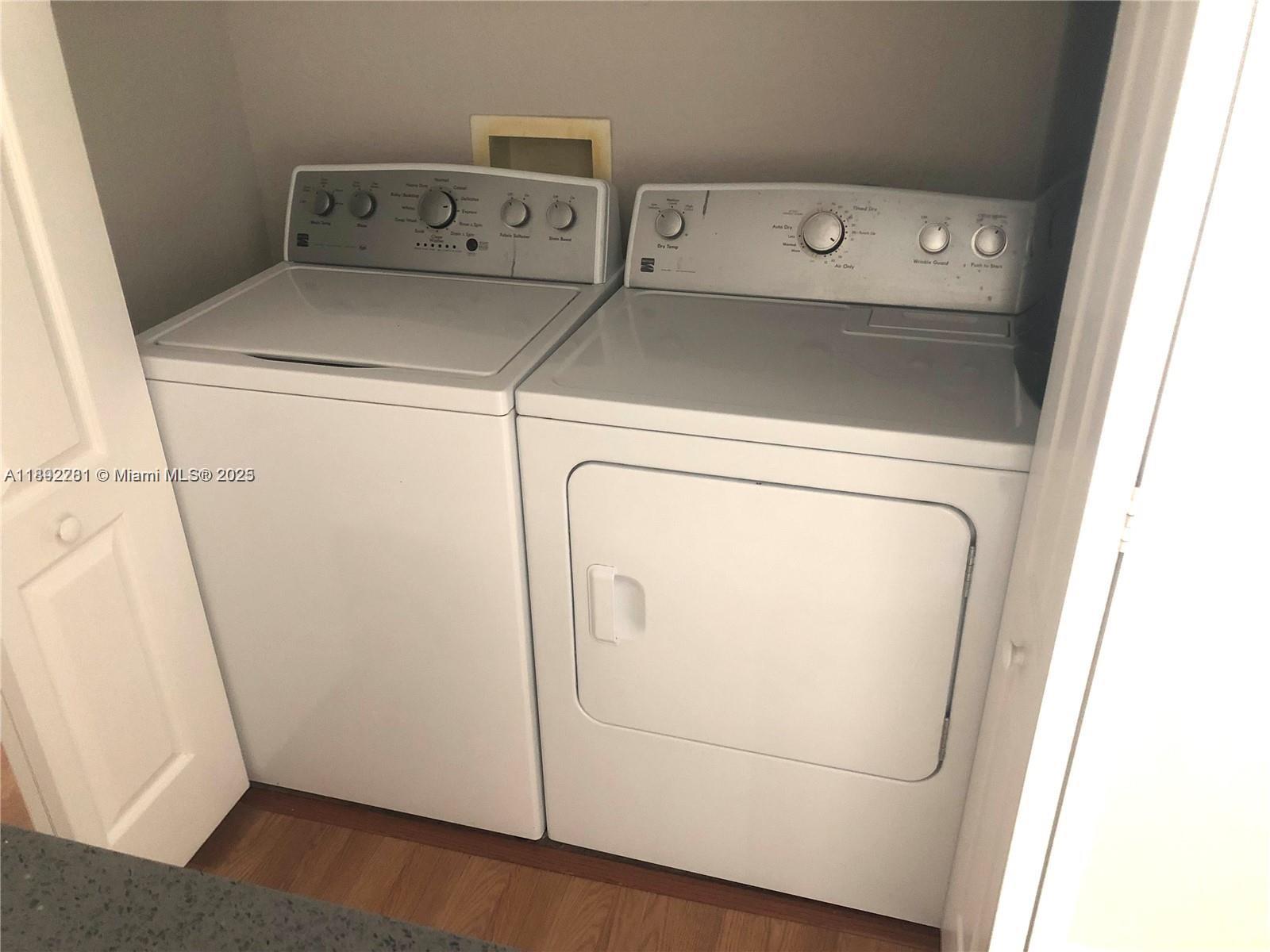 6001 Southwest 70th Street, Unit 528 South Miami, FL 33143 - Photo 10 of 21 a utility room with dryer and washer