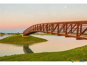 a view of a swimming pool with an ocean view