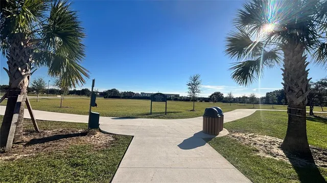 a view of a lake with a yard