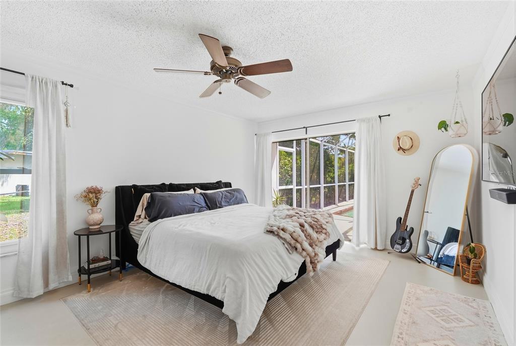 3927 Country View Lane Sarasota, FL 34233 - Photo 14 of 48 a bedroom with a bed and a window