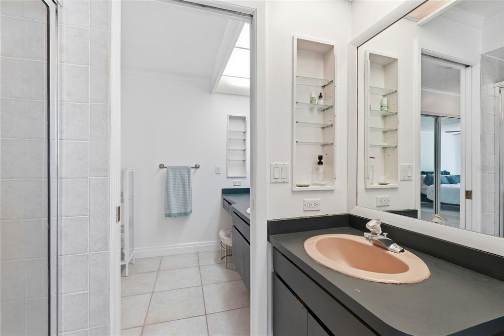 3927 Country View Lane Sarasota, FL 34233 - Photo 19 of 48 a bathroom with a sink and a mirror