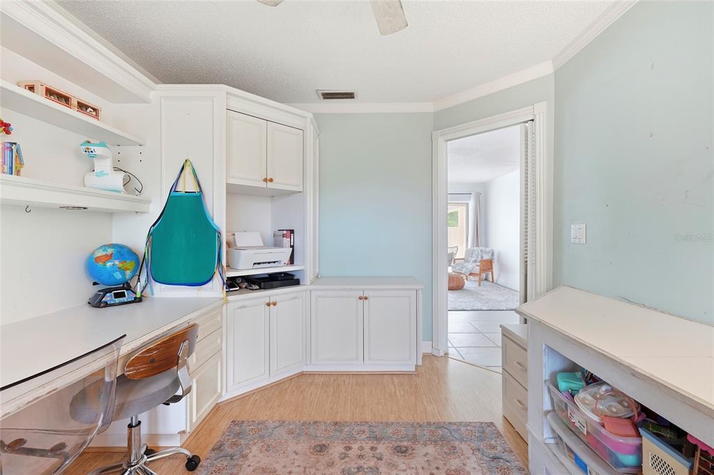 3927 Country View Lane Sarasota, FL 34233 - Photo 21 of 48 a room with sink and cabinets